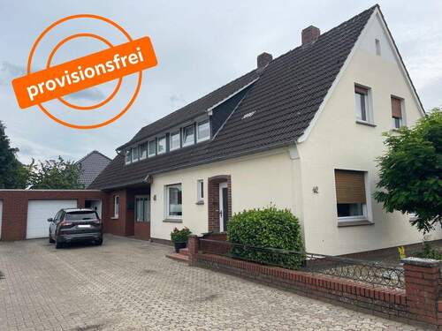 Ansicht - Selbst bewohnen oder vermieten: Zweifamilienhaus in ruhiger Siedlungslage