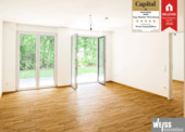 Wohnzimmer zur Terrasse - Barrierefreie 2-Zimmer Erdgeschoss-Wohnung mit Terrasse ab 55 Jahren