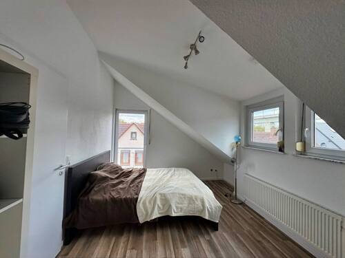 Schlafzimmer mit hoher Decke - 
