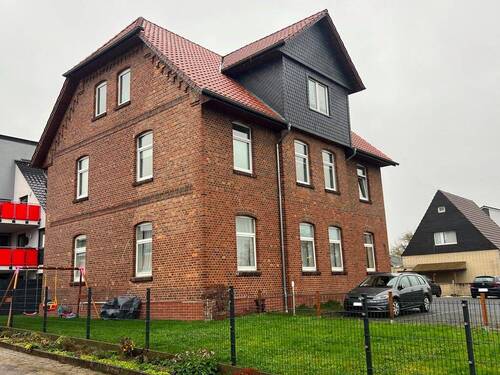 Ansicht - Eigentumswohnung mit Stellplatz im Erdgeschoss eines Dreifamilienhauses