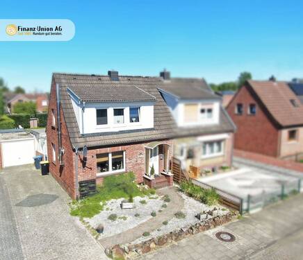 Außenansicht - Attraktive Doppelhaushälfte in Nordhorn-Blanke - ideales Zuhause für kleine Familien mit viel Gestaltungspotenzial und Gartenhighlight!