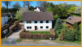 Frontansicht - Mehrfamilienhaus, Wohnhaus mit 180,00 m&sup2; in Schwalmstadt / Florshain zum Kaufen