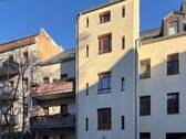 Hausrückansicht mit Balkon - Etagenwohnung mit 137,60 m&sup2; in Leipzig zum Kaufen
