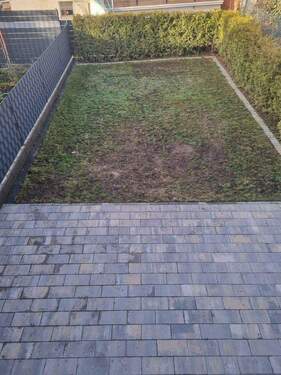 Terrasse/Garten vom Balkon aus - 