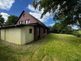Rückansicht mit Schuppen - 