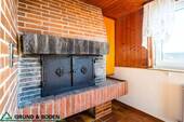 02 - Wohnzimmer - mit Ofen - 8 Zimmer Doppelhaushälfte in Göppingen