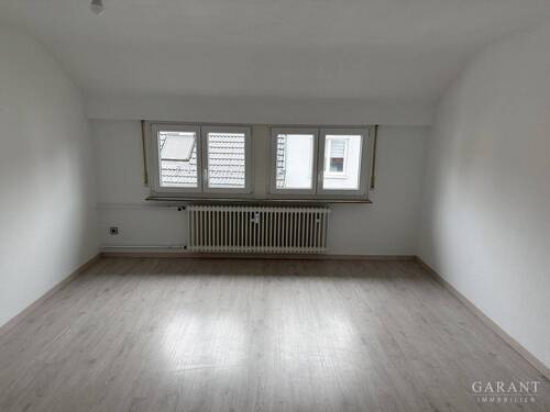 Wohnzimmer - Gut geschnittene 3 Zimmer-Wohnung auf 2 Etagen mit ca. 72 qm