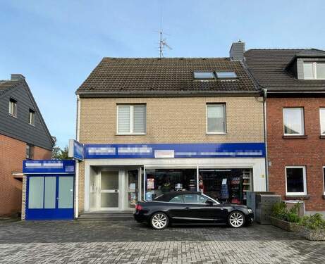 Ansicht - Gepflegtes Wohngeschäftshaus auf schönem Grundstück in belebter Lage