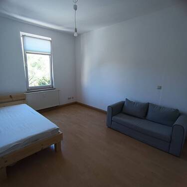 Schlafzimmer mit Sofa - 