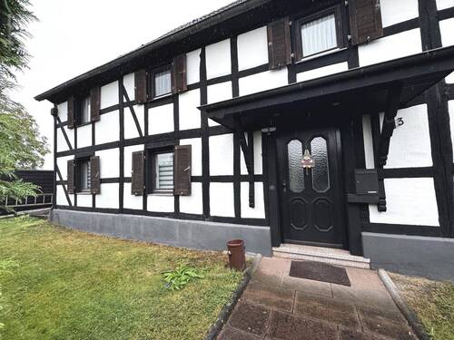 Vorderansicht links - 4 Zimmer Einfamilienhaus in Lohmar