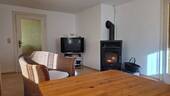Wohnzimmer mit Schwedenofen EG - 