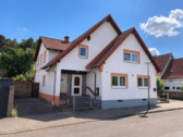 Außenansicht - Großzügige Eigentumswohnung im Erdgeschoss mit Garten und sonniger Terrasse
