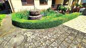 Garten mit Brunnen - 