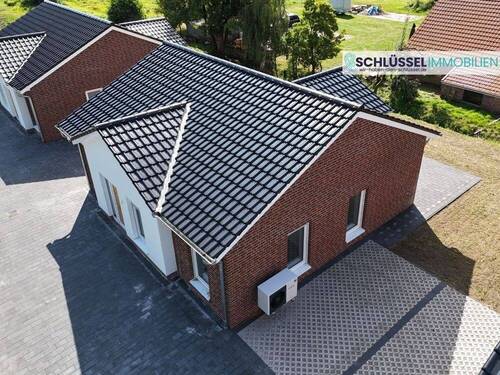 Luftbild - Bungalow mit 79,00 m² in Westoverledingen zum Kaufen