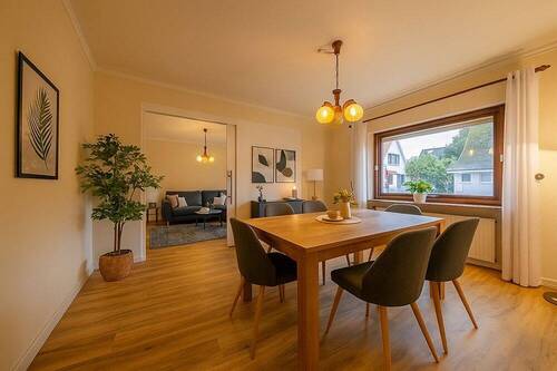 200-8680_Wohnzimmer-2_Var_Esszimmer_gestaged - 2 Zimmer Einfamilienhaus in Uetersen