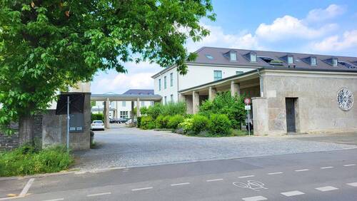 Einfahrt - Etagenwohnung mit 58,80 m&sup2; in Berlin zum Kaufen