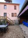 Rückseite mit Carport - 
