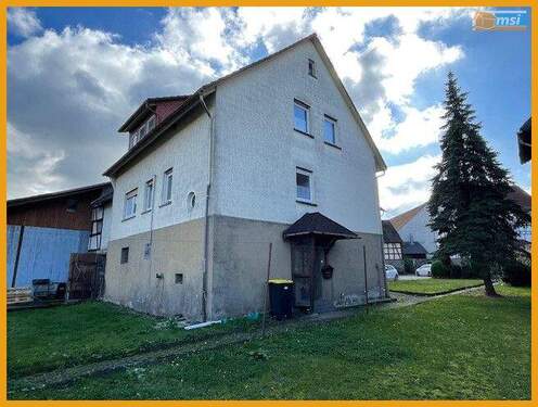 Hinteransicht - Mehrfamilienhaus, Wohnhaus mit 130,00 m² in Homberg Ohm zum Kaufen