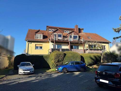 Hausansicht (Wohnung oben links) - 