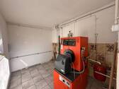 Heizungsraum mit Waschmaschinenanschluss - 