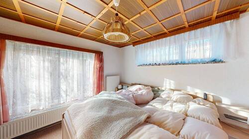 Schlafzimmer im Erdgeschoss - 