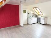 Wohnzimmer mit offener Küche - Etagenwohnung mit 55,00 m&sup2; in Niestetal zum Kaufen