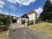 Blick auf EFH und Garage mit Nebengelass - 