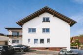 Hausansicht - (KI optimiert) - 1 Zimmer Mehrfamilienhaus, Wohnhaus zum Kaufen in Stockstadt am Main