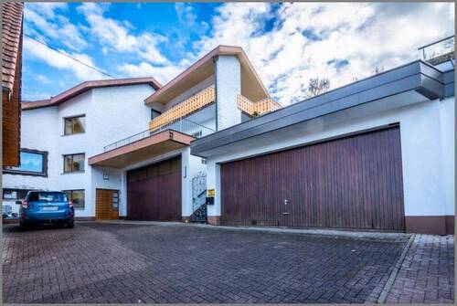 Doppelgaragen / Stellplätze - Mehrfamilienhaus, Wohnhaus mit 364,60 m² in Kappelrodeck zum Kaufen
