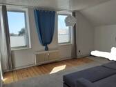 Wohnzimmer Bild 2 - Steinbergkirche: Gemütliche 2-Zimmer-Dachgeschoss-Wohnung im Ortskern