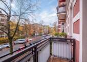 Blick vom Balkon in die Straße - Etagenwohnung mit 86,00 m² in Berlin zum Kaufen