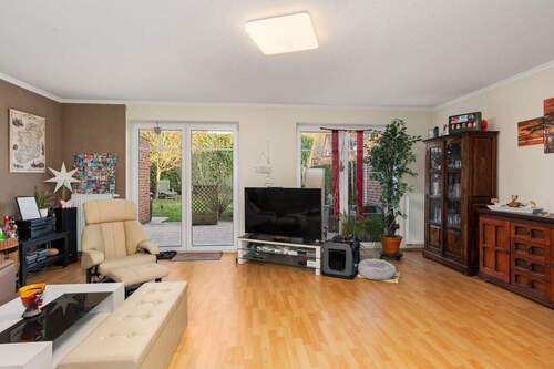 30,38 m² Wohnzimmer (Erdgeschoss) - 4 Zimmer Doppelhaushälfte zum Kaufen in Bad Laer