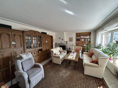 Wohnzimmer - 6 Zimmer Einfamilienhaus zum Kaufen in Münster