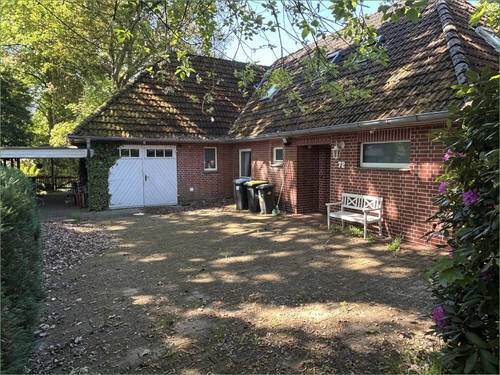 Bild 1 - Großzügiges Einfamilienhaus mit zusätzlicher Grünfläche in Hemsbünde