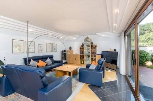 Wohnzmmer mit Ausgang zur Terrasse - 