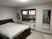 Schlafzimmer im Erdgeschoss - 
