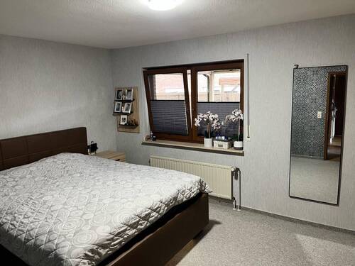 Schlafzimmer im Erdgeschoss - 