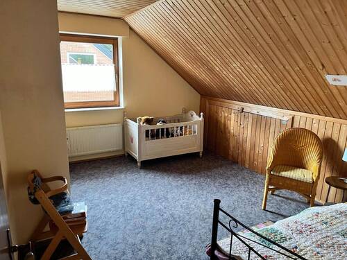 Schlafzimmer im Dachgeschoss - 