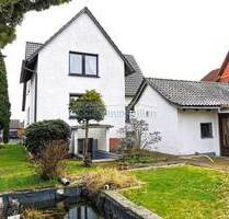 Gepflegtes Ein- bis Zweifamilienhaus mit Vollkeller, Garage, Carport und großem Garten - Grafhorst