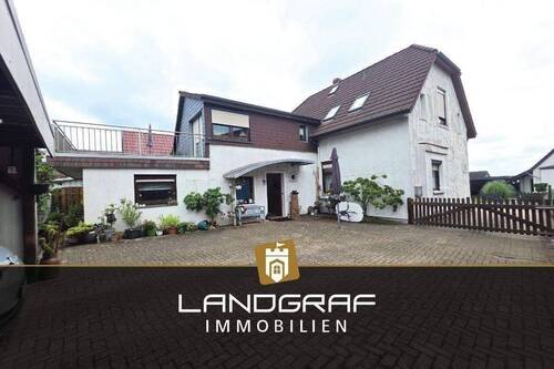 Einfamilienhaus - 6 Zimmer Mehrfamilienhaus, Wohnhaus zum Kaufen in Ritterhude
