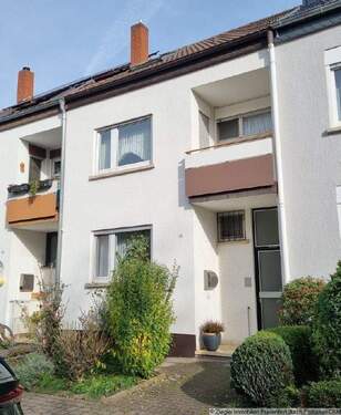 01 Straßenansicht - Gepflegtes Reihenhaus direkt am Schulzentrum von Ladenburg - 10004034