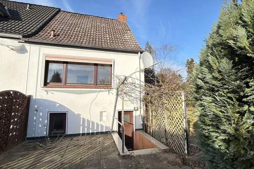 Rückwärtige Ansicht - 2 Zimmer Reihenendhaus zum Kaufen in Lübeck