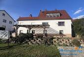 Bild 1 - Einfamilienhaus mit Einliegerwohnung und schöner Aussicht in Großhabersdorf!