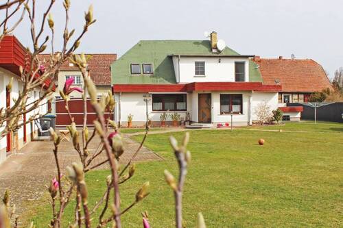 Rückseite Haus Blick von links - 5 Zimmer Einfamilienhaus zum Kaufen in Rathenow