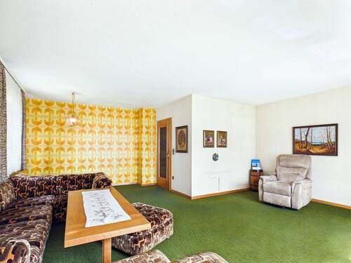 EG Wohnzimmer - Einfamilienhaus mit 179,00 m&sup2; in Winnenden zum Kaufen