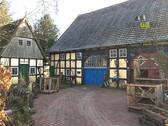 Hofstelle - Mehrfamilienhaus, Wohnhaus mit 273,00 m² in Melle / Hoyel zum Kaufen