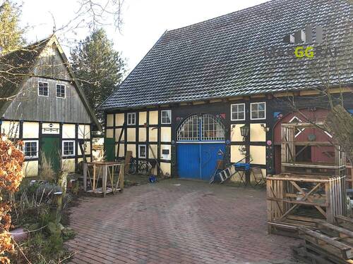 Hofstelle - Mehrfamilienhaus, Wohnhaus mit 273,00 m² in Melle / Hoyel zum Kaufen