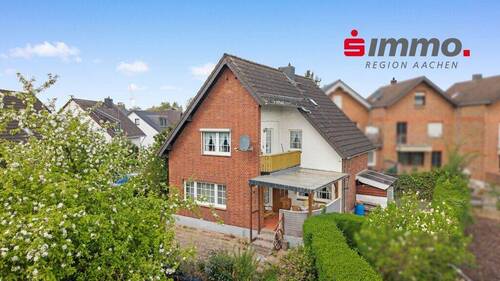 Titelbild mit Logo - Freistehendes Einfamilienhaus mit großer Doppelgarage