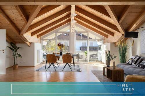 FINESTEP Immobilien GmbH - Exklusives Wohnjuwel am Feldrand - Dachgeschosswohnung mit drei Sonnenbalkonen
