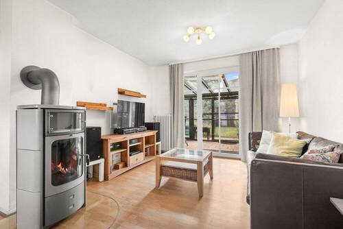 Wohnzimmer mit Kamin - 